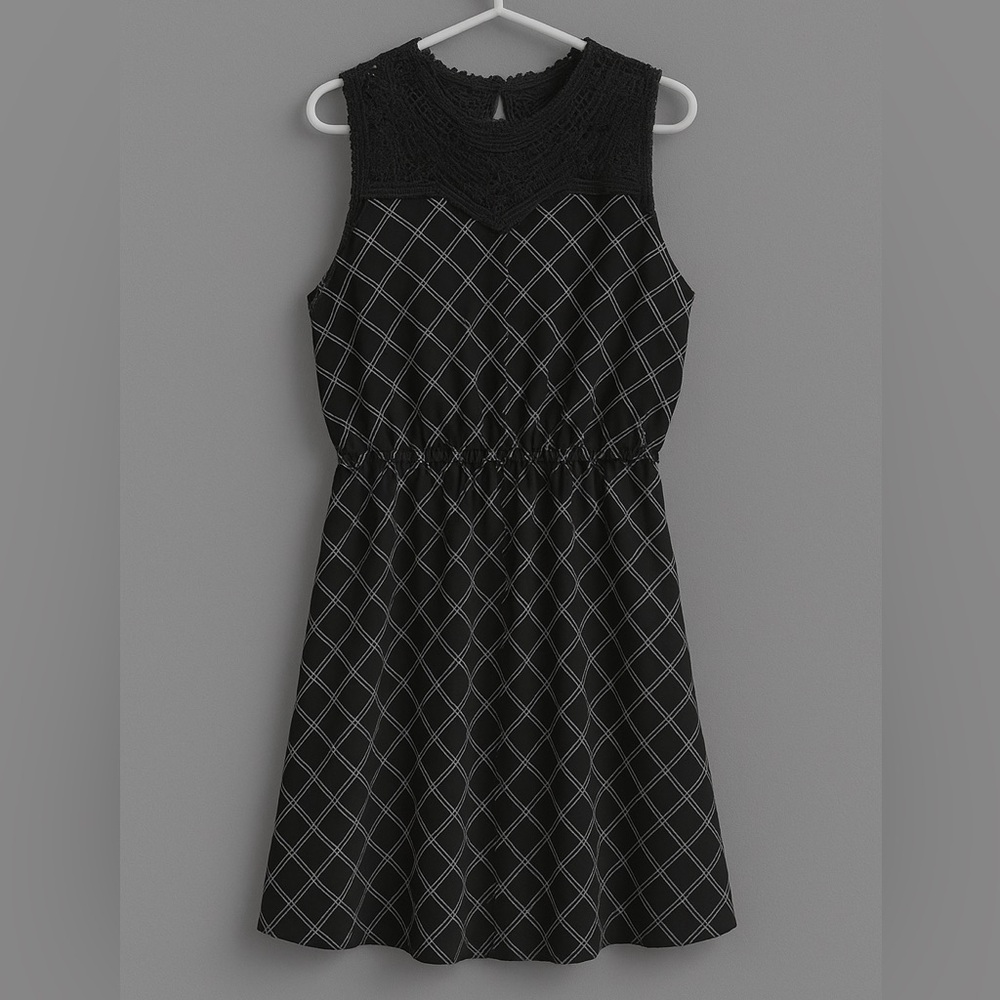 Black Maurices midi dress. NWT.
Size XL